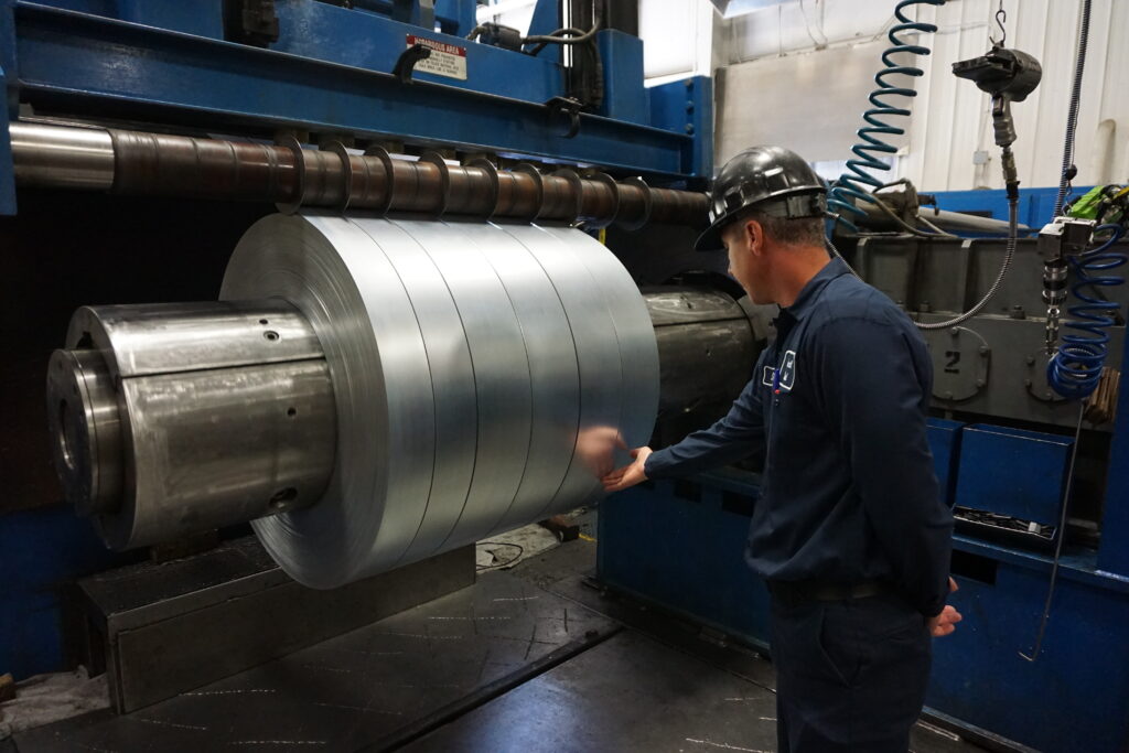 This is the difference between the oscillate wound coil and the ribbon wound coil which lays flat as seen in the photo.